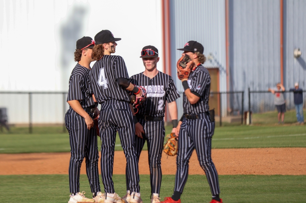 Warriors Hold Off Longhorns in First Game of 3A-1 District Series
